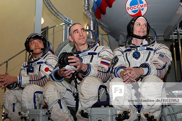 At the Gagarin Cosmonaut Training Center in Star City Russia Expedition 48-49 prime crew members Takuya Onishi of the Japan Aerospace Exploration Agency (left) Anatoly Ivanishin of Roscosmos (center) and Kate Rubins of NASA (right) field questions from reporters May 27 during their final Soyuz qualification exams. Rubins Onishi and Ivanishin will launch June 24 on the Soyuz MS-01 spacecraft from the Baikonur Cosmodrome in Kazakhstan for a four-month mission on the International Space Station.