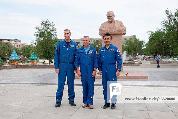 Expedition 3637 backup crew members Rick Mastracchio of NASA (left) Mikhail Tyurin (center) and Koichi Wakata of the Japan Aerospace Exploration Agency pose for pictures in front of a statue of Russian space Great Designer Sergei Korolev during a tour of the city of Baikonur Kazakhstan May 19. The trio is serving as backups for prime crew members Karen Nyberg of NASA Soyuz Commander Fyodor Yurchikhin and Luca Parmitano of the European Space Agency who are preparing for launch May 29 Kazakh time in their Soyuz TMA-09M spacecraft to begin a 5 ½ month mission on the International Space Station.Victor Zelentsov