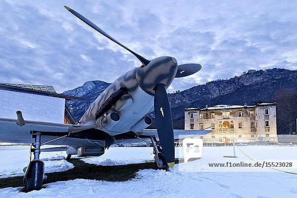 The Aermacchi 205 airplane and the Albere Palace in Trento. Trentino Alto-Adige Italy Europe.
