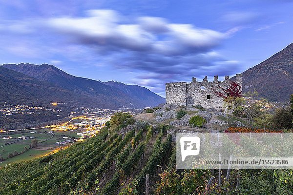 Grumello castle at dusk. Sondrio Valtellina Lombardy Italy Europe.