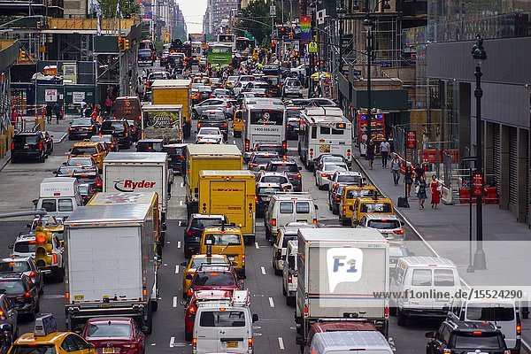 Vehicles clog Tenth Avenue in New York on Tuesday July 2 2019 as they attempt to enter the Lincoln Tunnel during the Great Fourth of July Getaway. A truck crashing over a guardrail on the New Jersey side of the tunnel has completely snarled traffic for hours. (© Richard B. Levine).