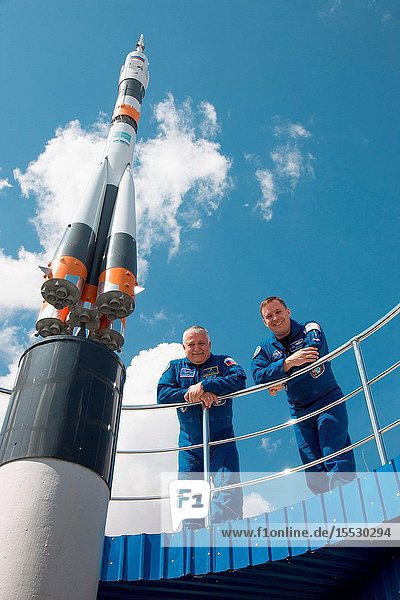 At the Cosmonaut Hotel crew quarters in Baikonur Kazakhstan Expedition 51 crewmembers Fyodor Yurchikhin of the Russian Federal Space Agency (Roscosmos left) and Jack Fischer of NASA (right) pose for pictures next to a Soyuz rocket model April 13 as part of pre-launch activities. Fischer and Yurchikhin will liftoff April 20 from the Baikonur Cosmodrome on the Soyuz MS-04 spacecraft for a four and a half month mission on the International Space Station. NASAVictor Zelentsov