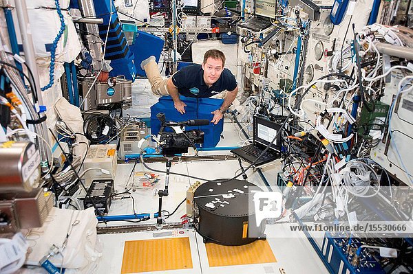 Astronaut Thomas Pesquet of the European Space Agency (ESA) participates in the Fluidics experiment inside the Columbus laboratory module developed by ESA. Fluidics is exploring how liquids behave in spacecraft tanks and wave turbulence phenomena that occurs at the surface of liquids.