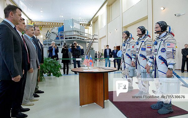 Expedition 52 backup crew members: Mark Vande Hei of NASA suited left Alexander Misurkin of Roscosmos center and Norishige Kanai of the Japan Aerospace Exploration Agency (JAXA) meet with Cosmonaut Yuri Gidzenko left Cosmonaut Yuri Malenchenko Deputy Director GCTC Cosmonaut Alexander Kaleri and John McBrine NASA Director of Operations GCTC ahead of the crew's Soyuz qualification exams Thursday July 6 2017 at the Gagarin Cosmonaut Training Center (GCTC) in Star City Russia. Photo Credit: (NASABill Ingalls)