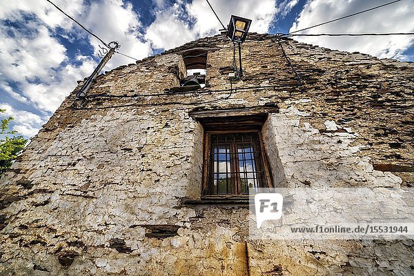 Window bell and lamppot on old hermitage at El Espinar. Guadalajara. Spain. Europe.