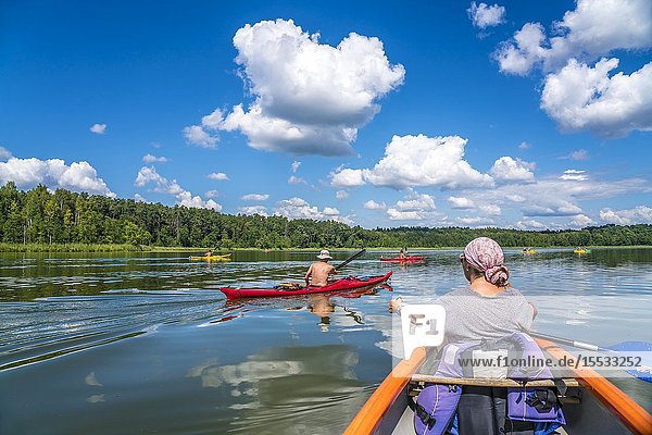 Canoe and kayaks on the Wet Lake Jezioro MokreL UNESCO biosphere reserve Masurian Lakes near Krutyn Warmian-Masurian Poland Europe.