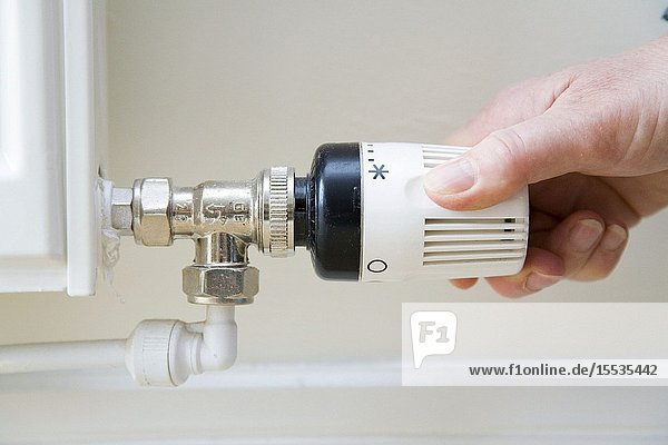 Thermostat on a radiator being turned down