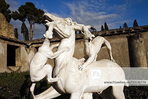 Casa dei Cervi deer sculpture attacked by dogs The excavations of Ercolano Ruins of Herculaneum was an ancient Roman town destroyed by volcan Mount Vesuvius Ercolano comune of Ercolano Campania Italy Europe.