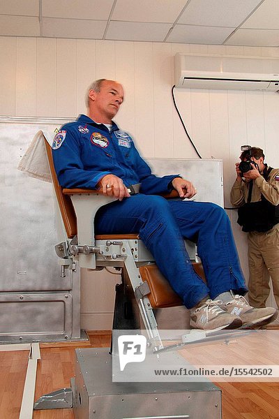 At his crew quarters in Baikonur Kazakhstan NASA astronaut Jeff Williams Expedition 21 flight engineer received prelaunch physical conditioning in a rotating chair Sept. 24 2009 as he prepares for liftoff to the International Space Station on September 30 with Russian cosmonaut Max Suraev Soyuz Commander and spaceflight participant Guy Laliberte in their Soyuz TMA-16 spacecraft. Photo credit: NASAVictor Zelentsov