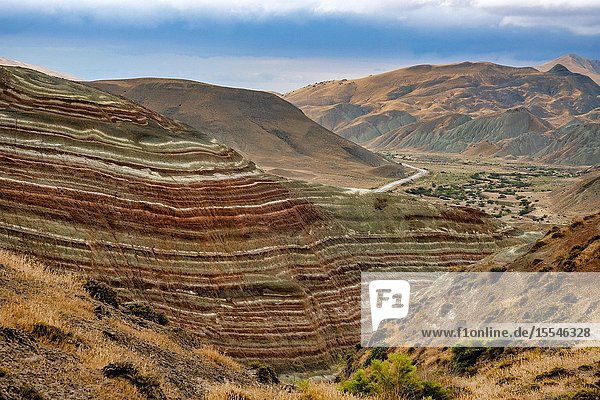 Candy Cane Mountains Khizi District Azerbaijan.The mountains' colours are produced by groundwater that have altered the oxidation state of the iron compounds in the earth.