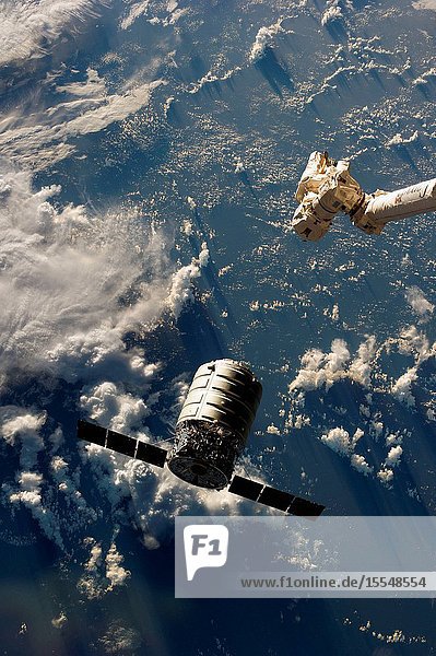 The Canadarm2 moves toward the first Cygnus commercial cargo spacecraft built by Orbital Sciences Corp. as it approaches the International Space Station. The two spacecraft converged at 7:01 a.m. EDT on Sept. 29 2013.