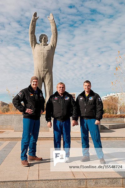 The Expedition 3839 backup crew members pose for pictures in front of a statue of Yuri Gagarin the first human to fly in space during a tour of the city of Baikonur Kazakhstan Oct. 27. Alexander Gerst of the European Space Agency (left) Russian cosmonaut Max Suraev (center) and Reid Wiseman of NASA are understudies to the prime crew Koichi Wakata of the Japan Aerospace Exploration Agency Soyuz Commander Mikhail Tyurin and Rick Mastracchio of NASA who are scheduled to launch Nov. 7 Kazakh time in the Soyuz TMA-11M spacecraft from Baikonur to begin a six-month mission on the International Space Station.Victor Zelentsov