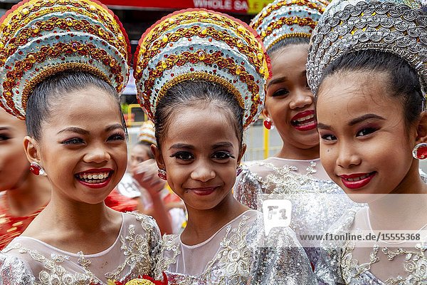 A Group Of Filipino Elementary Schoolchildren Pose For A Photo During The Tambor Trumpa Martsa Musika (Drum & Bugle Corps) Contest  Dinagyang Festival  Iloilo  Panay Island  The Philippines.