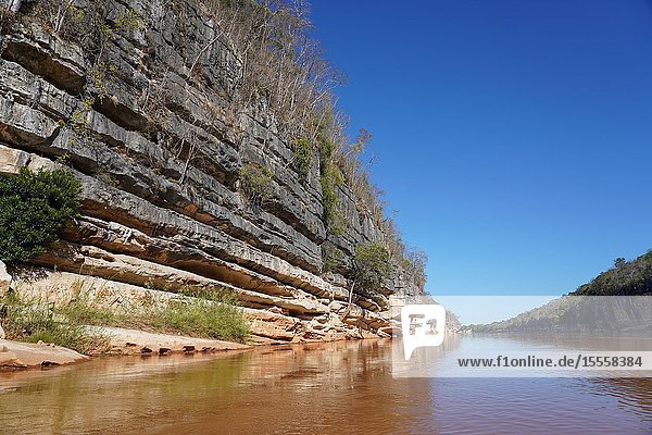 Pirogue excursion along Manambolo river crossing Tsingy de Bemaraha National Park, Melaky Region, Western Madagascar.