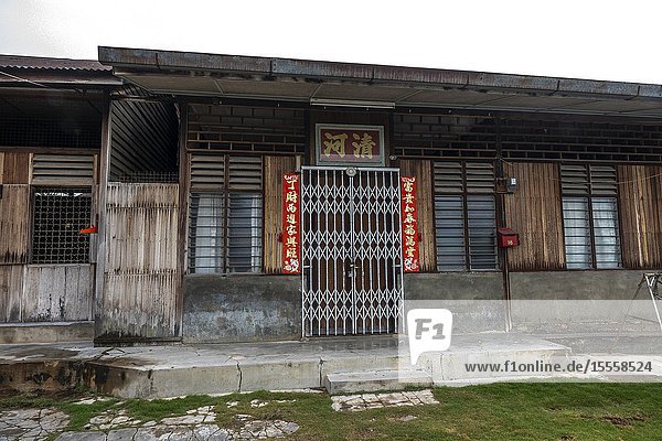An old wooden chinese house in Bukit Koman Raub Pahang Malaysia.