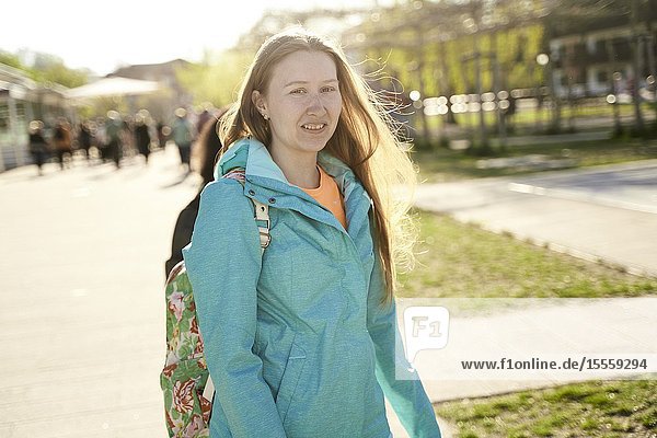 Insecure woman outdoors at tourist destination Prien am Chiemsee Bavaria Germany