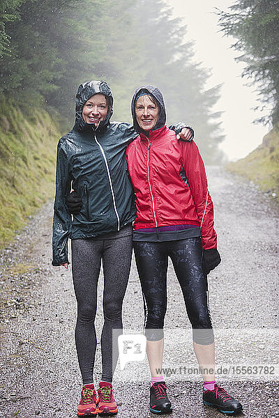 Portrait hiking jogging in rain