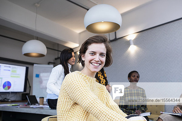 Portrait smiling  confident businesswoman in conference room meeting