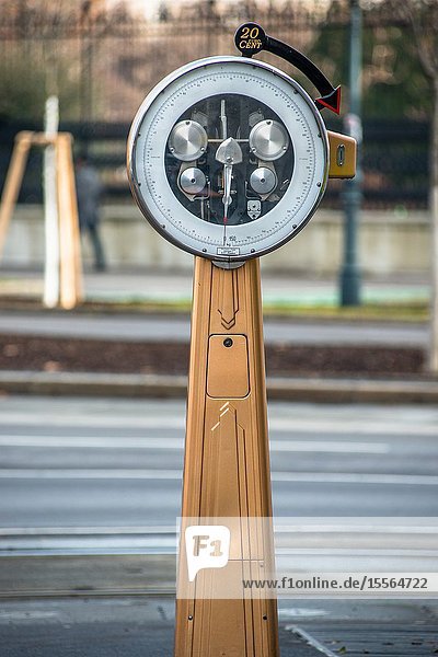 Outdoor vintage pay scales on the street in Vienna, Austria.
