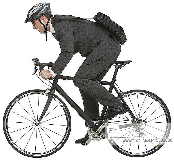 Businessman riding bicycle