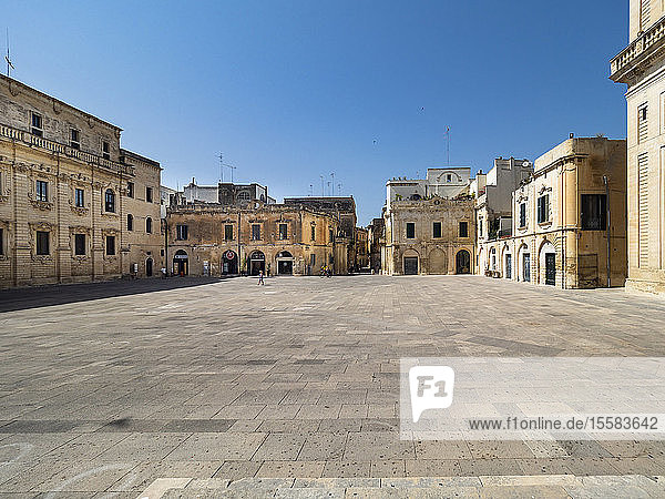 View of old residential buildings against clear blue sky in Lecce  Italy