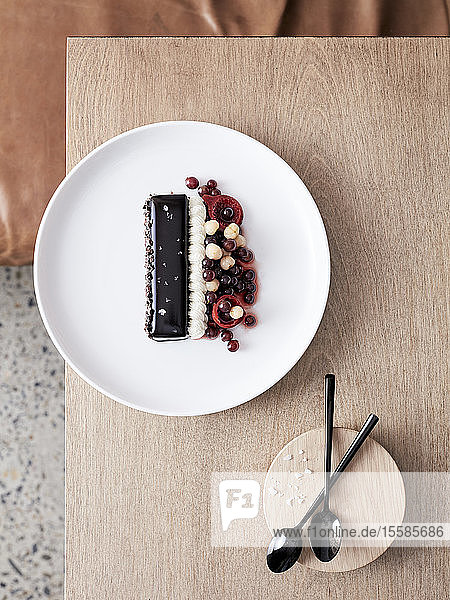 Glazed chocolate slice with soured cream cherries