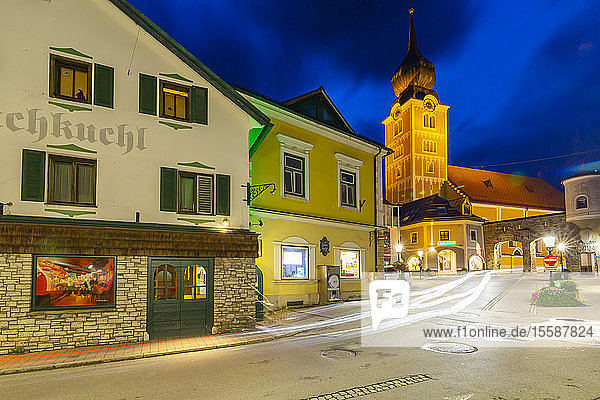 View of church and local buildings at dusk  Schladming  Styria  Austrian Tyrol  Austria