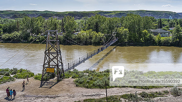 Star Mine Suspension Bridge a 117 metre long pedestrian suspension bridge across the Red Deer River; Drumheller Alberta Canada