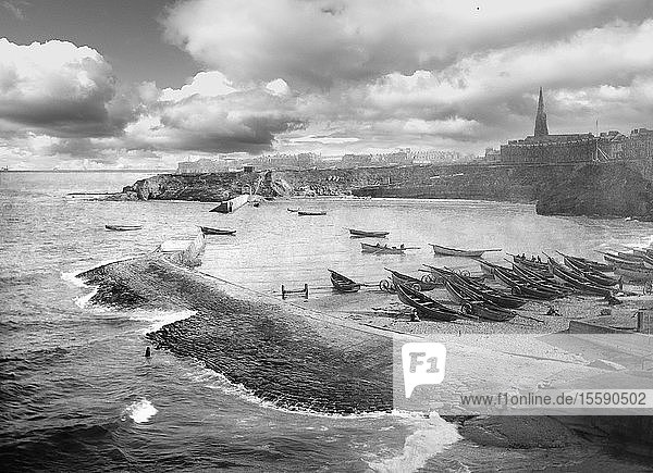 Old photograph circa 1900  Victorian/Edwardian  social history. Cullercoats Bay with coble fishing boats; Cullercoats  Tyne and Wear  England