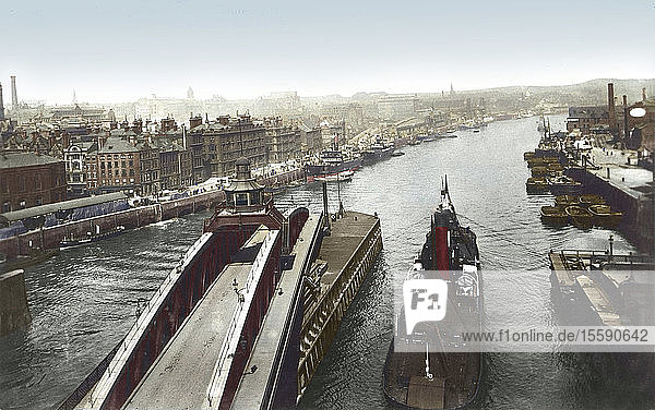 Postcard circa 1900  Victorian/Edwardian  social history. The swing bridge at Newcastle upon Tyne with quayside and ships; Newcastle upon Tyne  Tyne and Wear  England