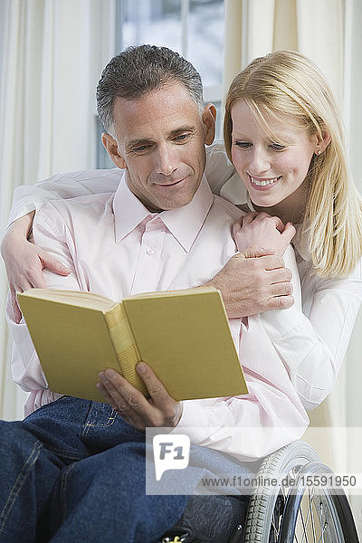 Couple reading a book