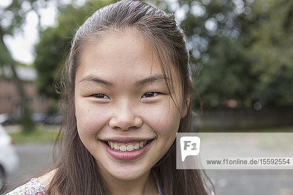 Portrait of a happy teen girl with Learning Disability