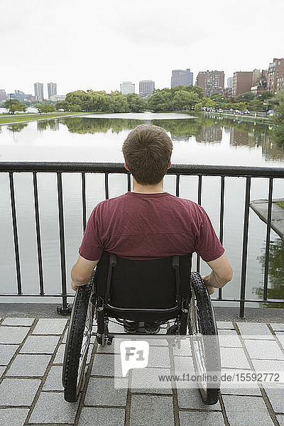 Rear view of a handicapped man looking at view
