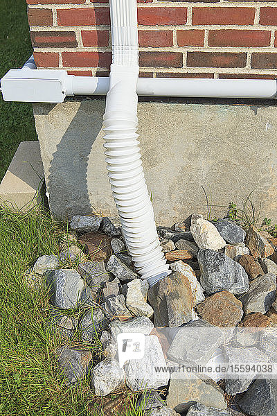 Rain water run-off into rock bed from building