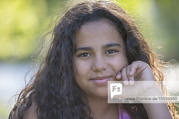 Portrait of Hispanic teen girl smiling