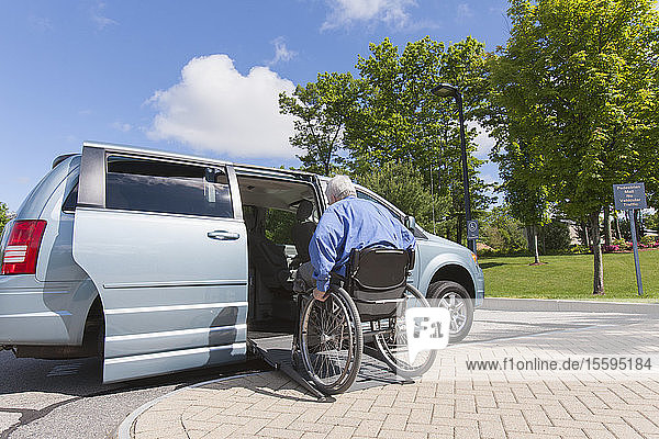 Man with muscular dystrophy and diabetes getting in an accessible van
