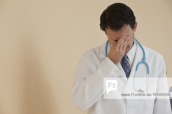 Doctor looking depressed