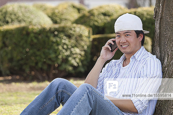 Chinese student talking on a cell phone