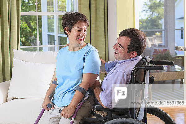 Couple with Cerebral Palsy acting with affection