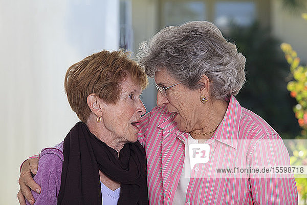 Senior friends gossiping