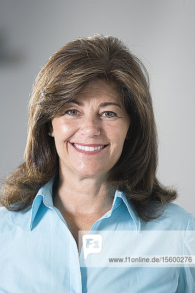 Portrait of a mature woman smiling.