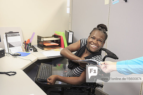 Teen with Cerebral Palsy and Cognitive issues at work