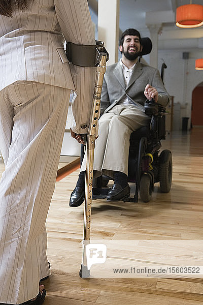 View of a handicapped man and woman in conversation