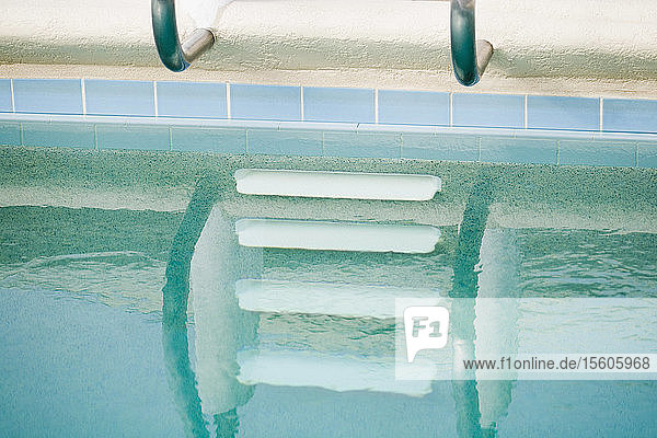 Reflection of steps in a swimming pool