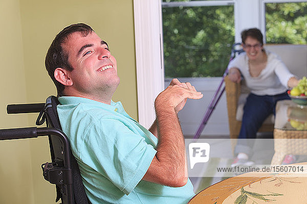 Couple in their home both with Cerebral Palsy