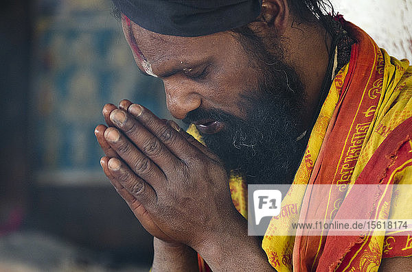 Hindu sadahu praying at Indreshwar Mahadev Temple in city of Panaut