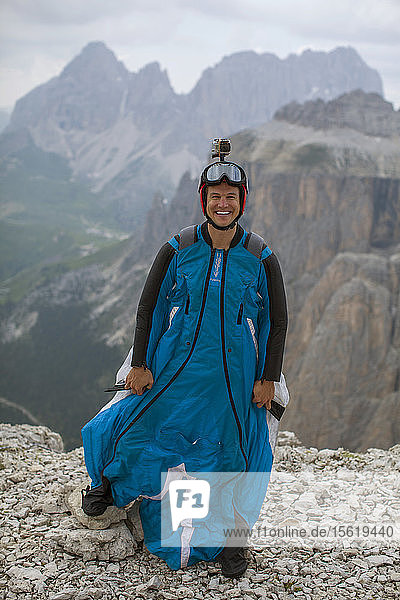 Portrait of a BASE jumper just before taking flight in the Sass Pordoi region of the Dolomites in Northeastern Italy.