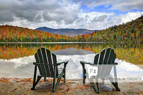 Two Adirondack Chairs On The Bank Of Heart Lake At Adirondack Park