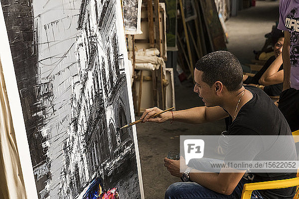 Cuban painter in a gallery in Havana  Cuba