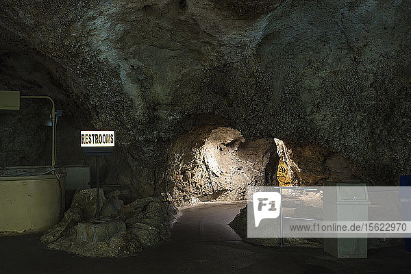 A Lit Trail Leads Into A Hallway To The Bathroom In A Giant Underground Cavern